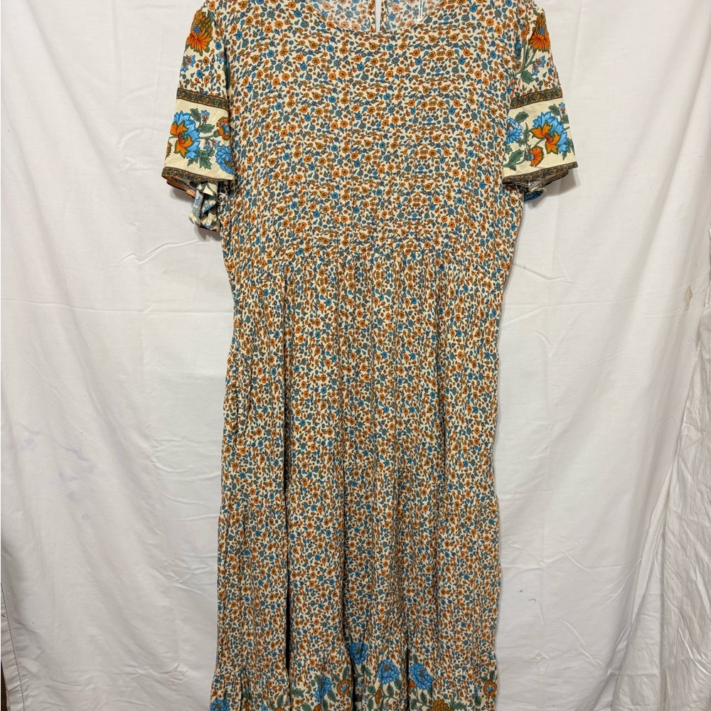 Prairie Dress in a medium ditsy floral print, cap sleeve and tiered midi.